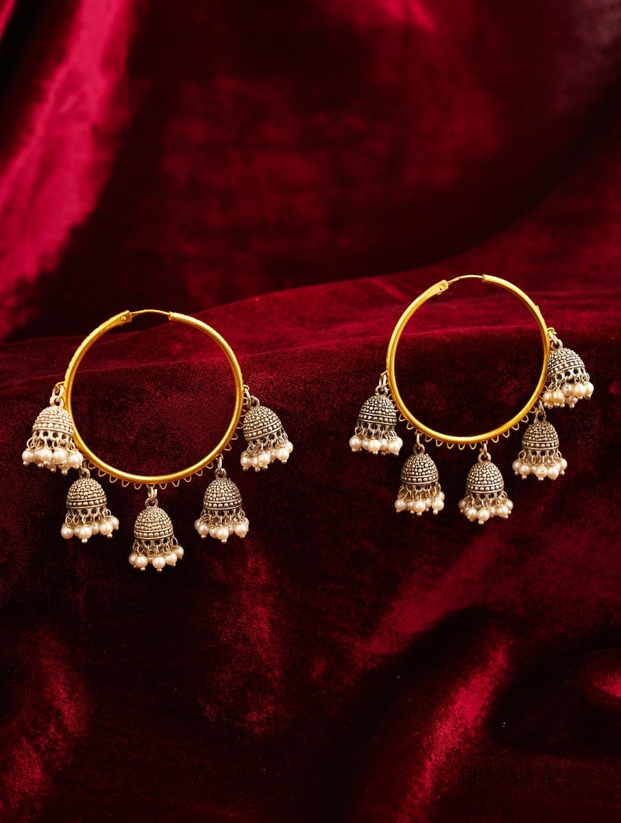 Classic Gold Plated Bali Earring with intricate silver jhumka charms and pearl details on red velvet background