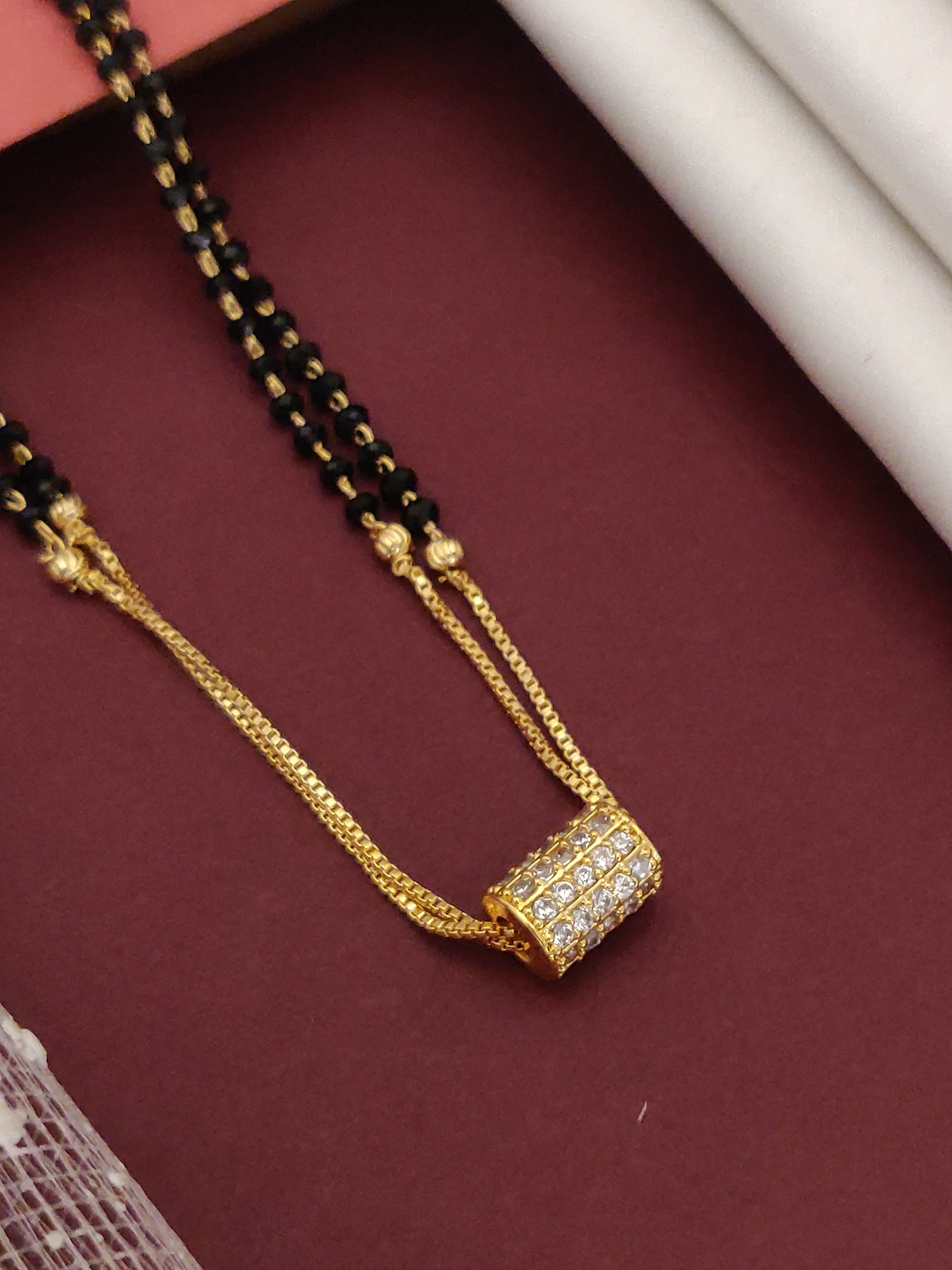DailyWear Gold Plated American Diamond Mangalsutra with elegant pendant and black beads