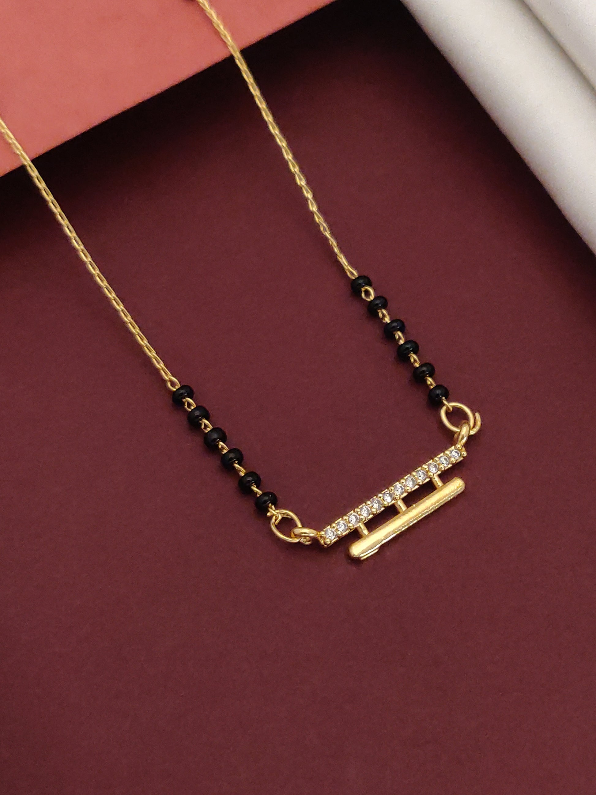 DailyWear Gold Plated American Diamond Mangalsutra with elegant design and black beads
