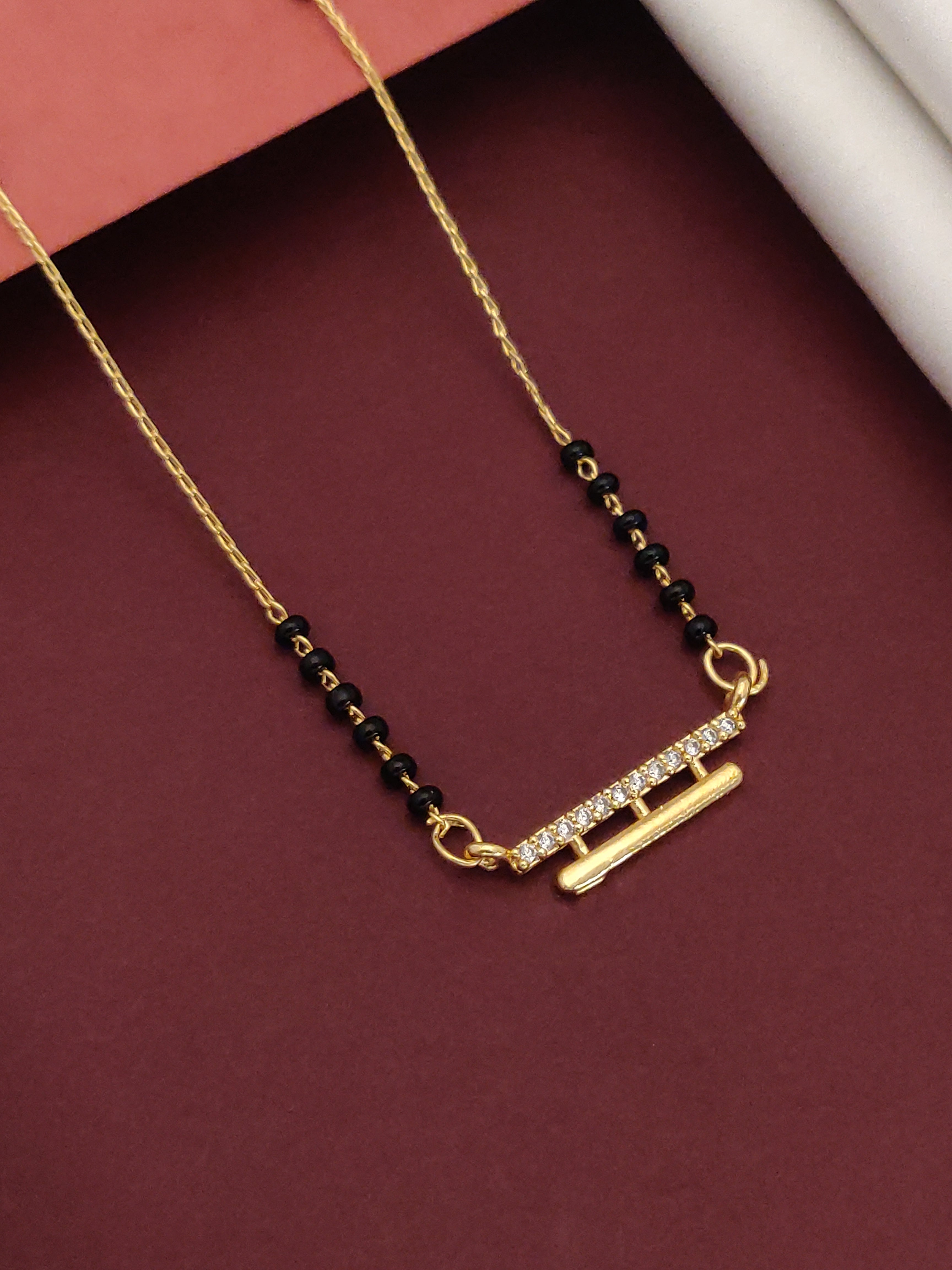 DailyWear Gold Plated American Diamond Mangalsutra with elegant design and black beads