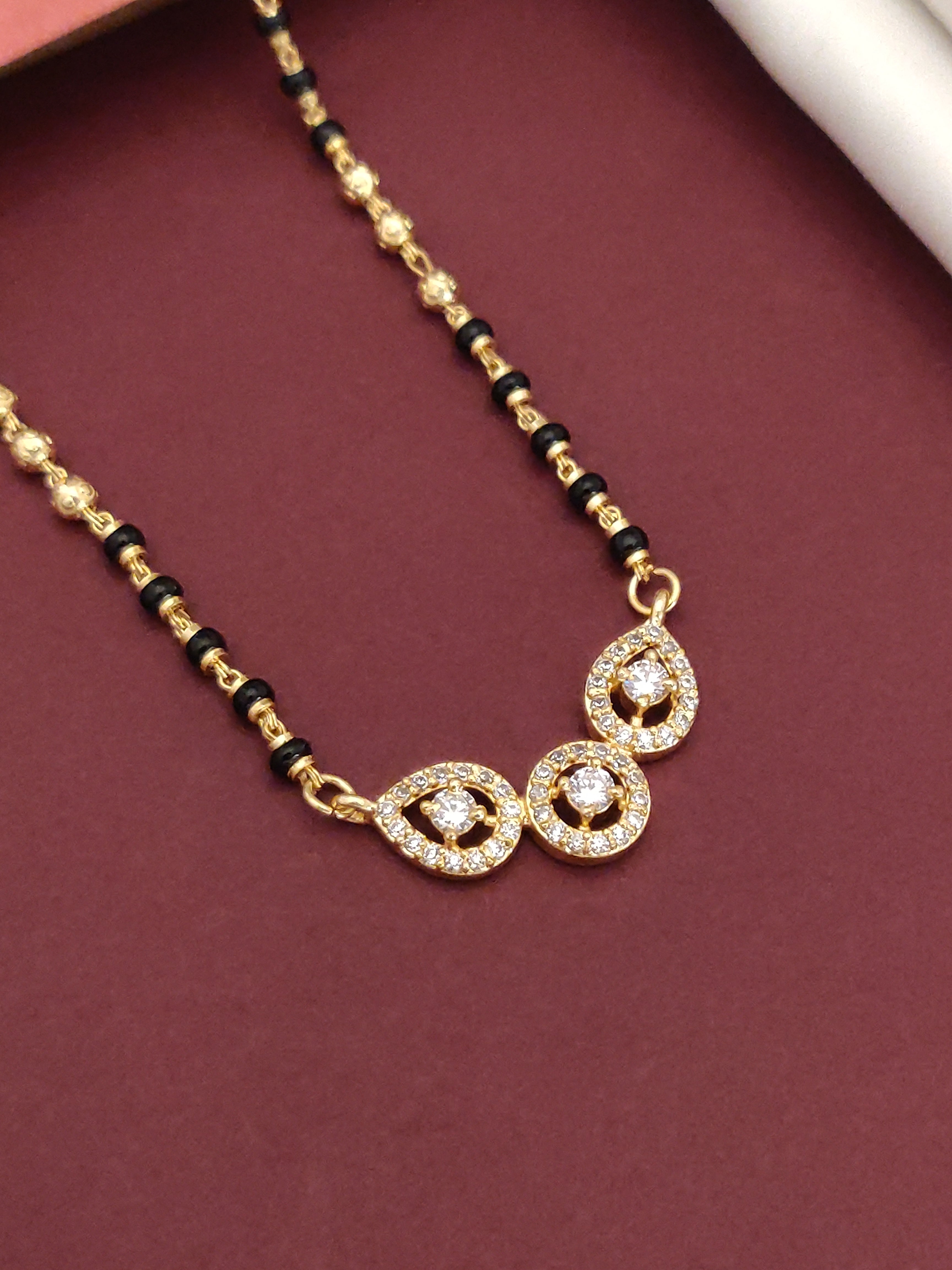 Elegant DailyWear Gold Plated American Diamond Mangalsutra with tear-shaped pendants and intricate detailing