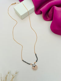 Thumbnail for Dazzling American Diamond Mangalsutra with black beads and intricate gold pendant by Abdesignsjewellery