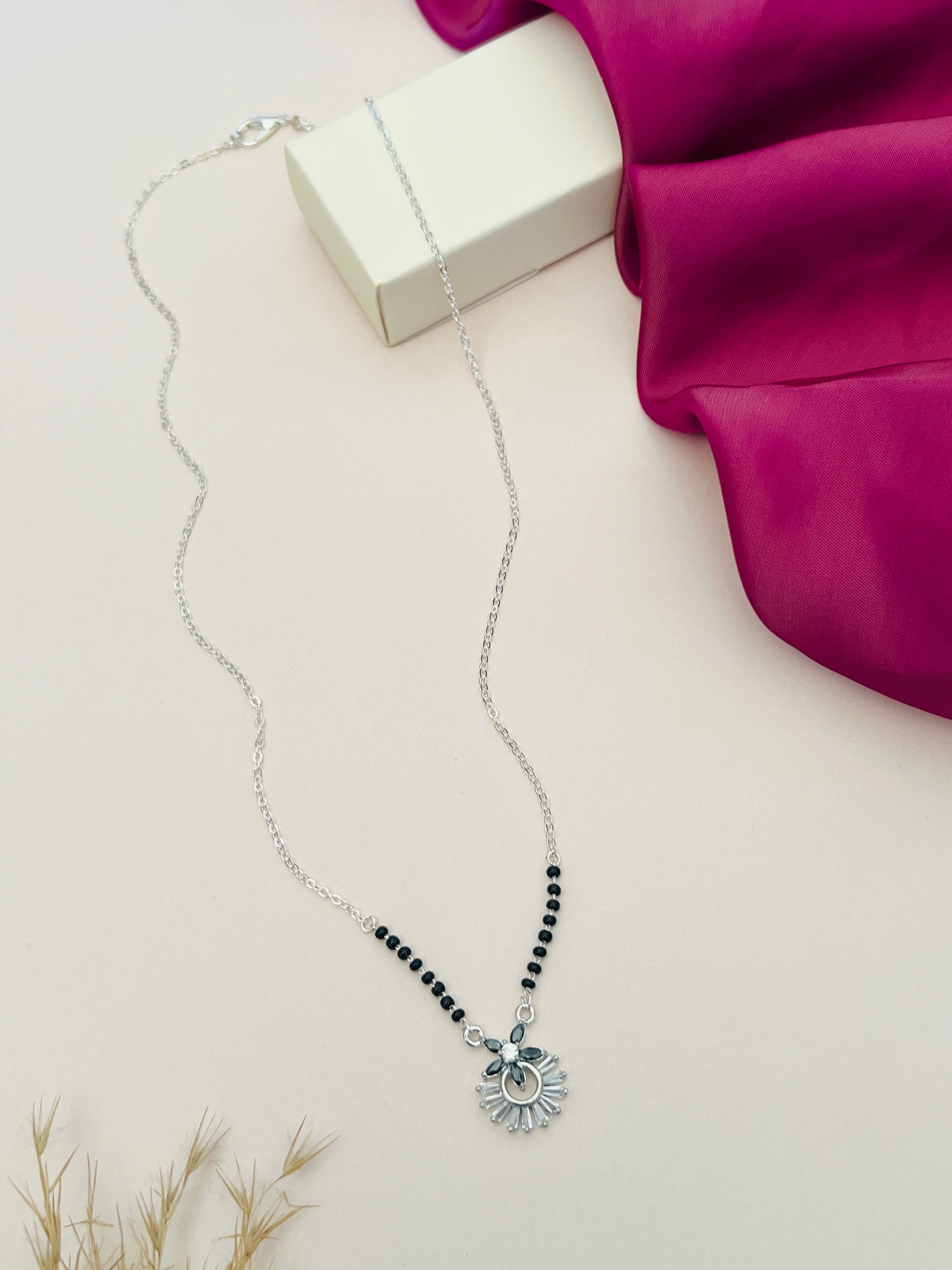 Dazzling American Diamond Mangalsutra with black beads and silver pendant by Abdesigns