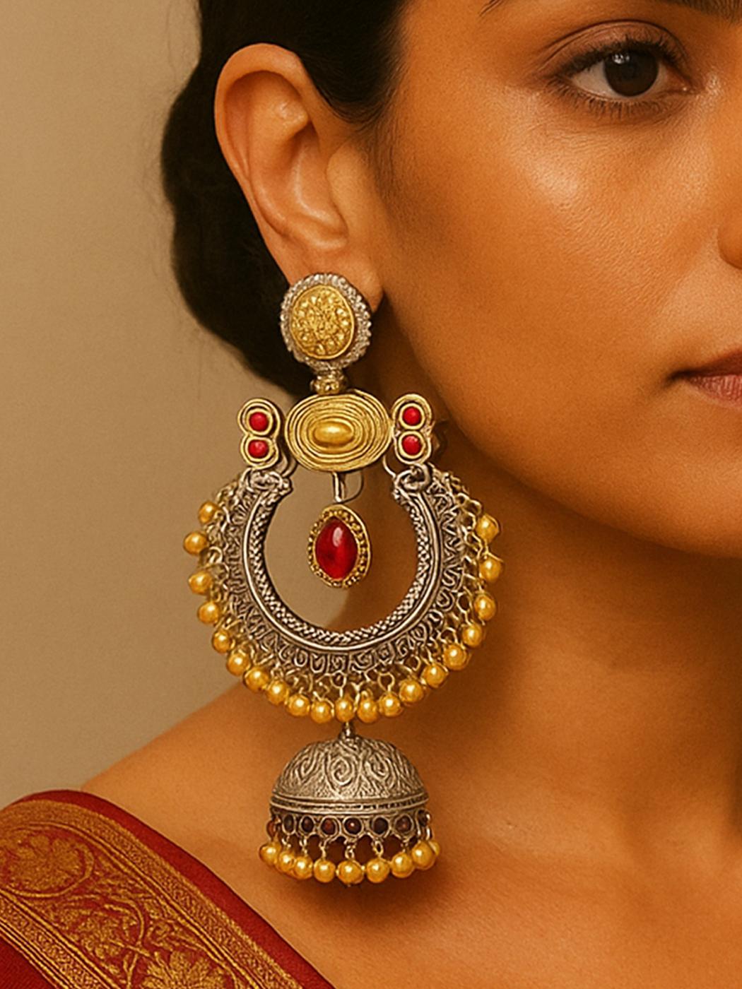 Dual Tone Plated Chandbali Earring with intricate silver design and colorful accents worn by a model