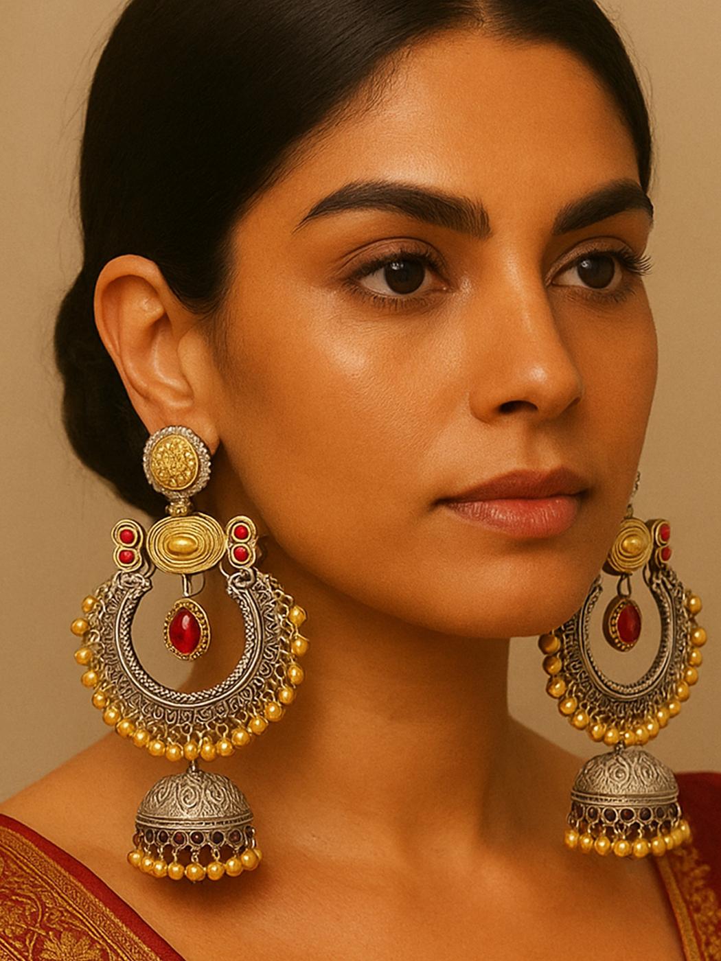Elegant Dual Tone Plated Chandbali Earring with intricate designs and colorful accents displayed on model