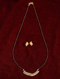 Thumbnail for Elegant Gold Plated American Diamond Mangalsutra Set with matching earrings on a dark red background