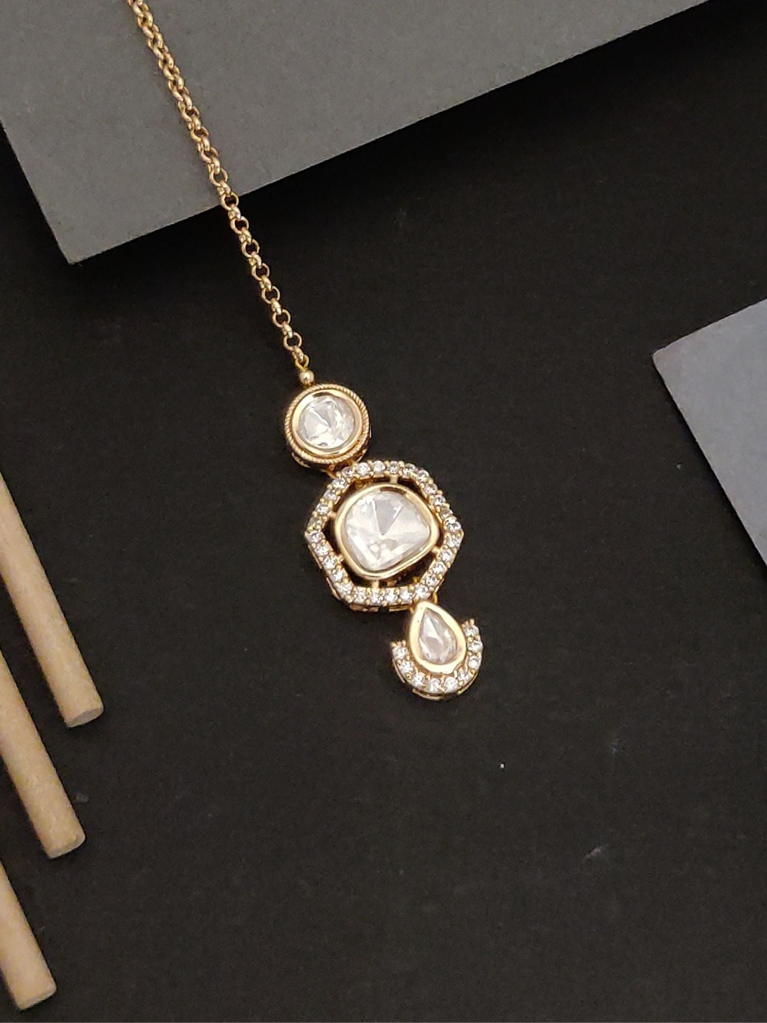 Elegant Gold plated Polki Diamond Maangtikka with intricate design and chain from Abdesignsjewellery