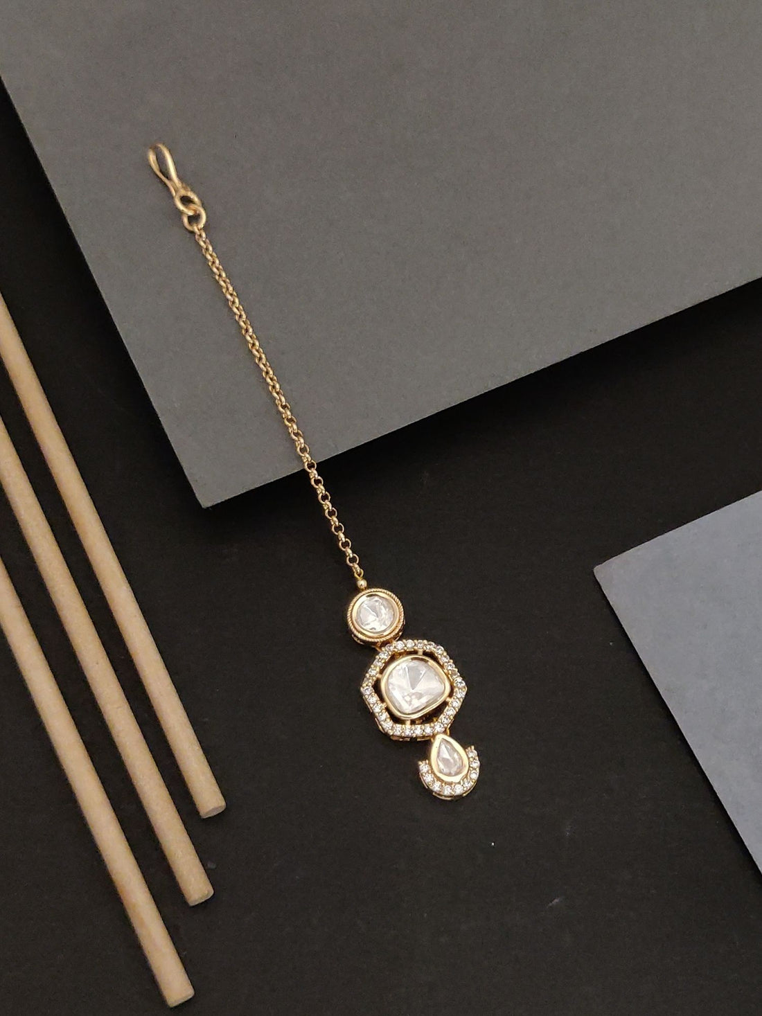 Elegant Gold plated Polki Diamond Maangtikka with intricate design and chain by Abdesignsjewellery