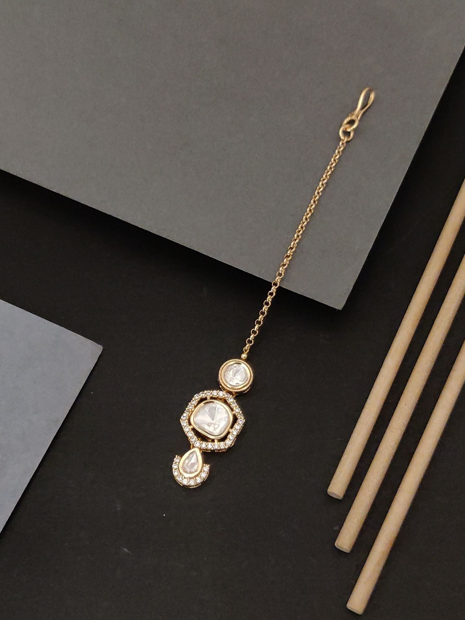 Elegant Gold plated Polki Diamond Maangtikka with intricate design by Abdesignsjewellery