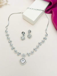 Thumbnail for Elegant Necklace with Sparkling Stones and matching earrings by Abdesignsjewellery displayed on white and pink background