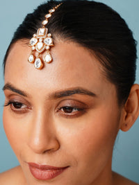 Thumbnail for Elegant Polki Paachi Kundan Maangtikka worn on forehead by woman with neat hairstyle