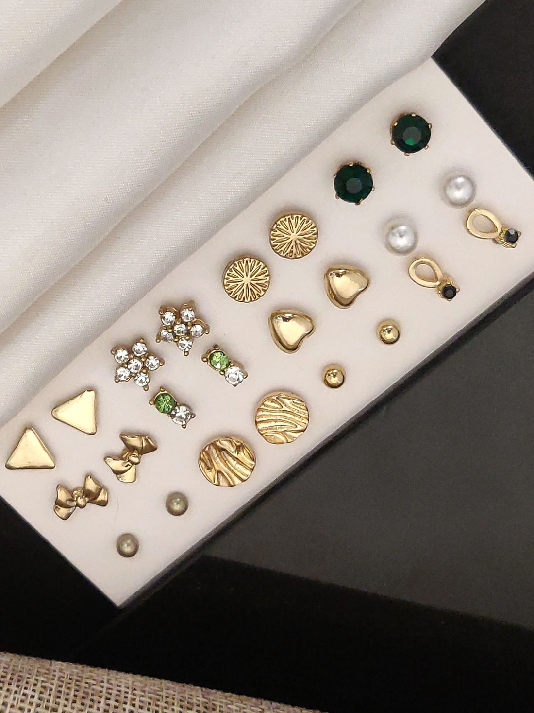 Elegant Set Of 12 Gold Plated Studs Earring Combo featuring various designs and gems for versatile styling