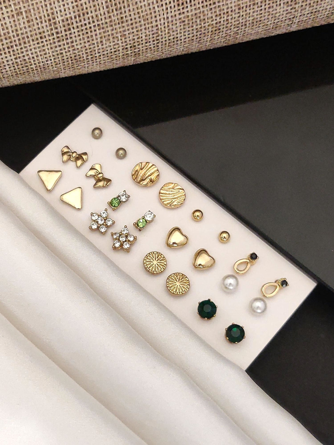 Elegant Set Of 12 Gold Plated Studs Earring Combo featuring various designs and gems for versatile styling