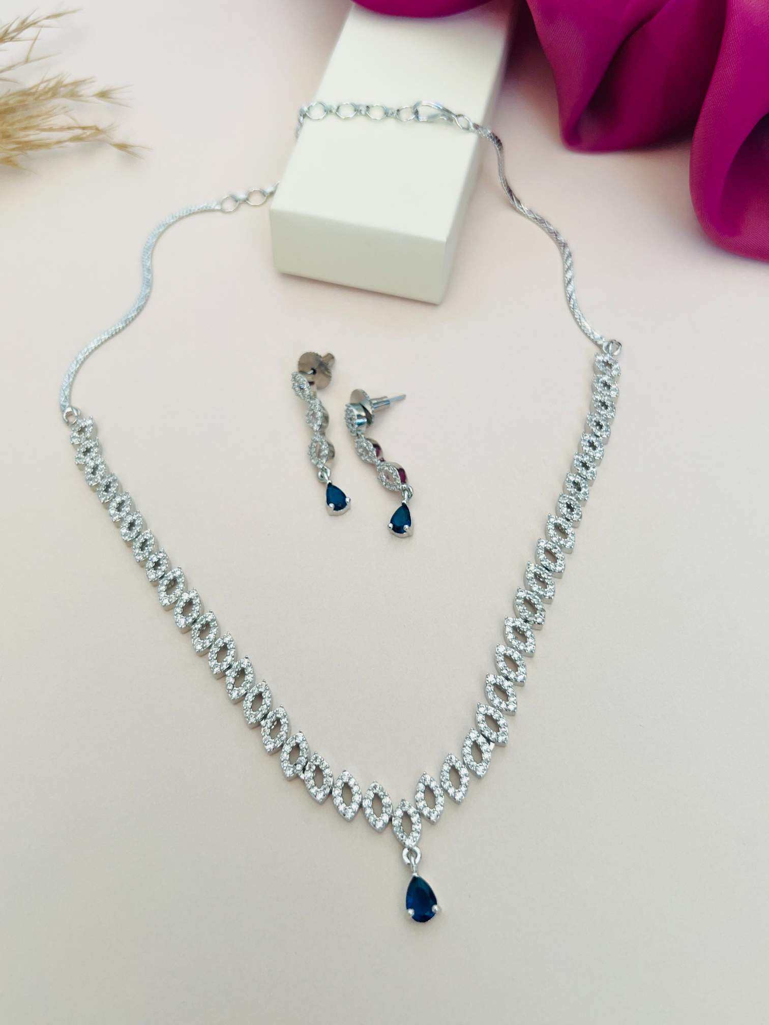 Elegant Silver Plated American Diamond Necklace Set with blue teardrop pendant and matching earrings