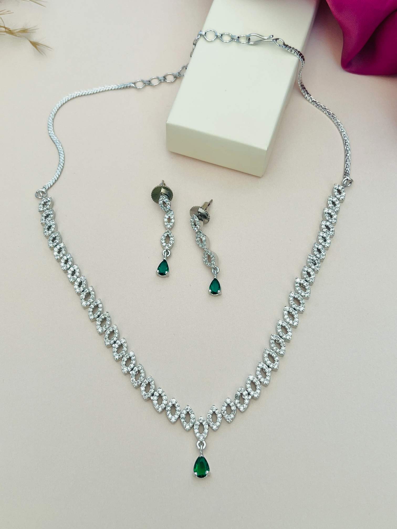 Elegant Silver Plated American Diamond Necklace Set with green teardrop stones and matching earrings by Abdesignsjewellery