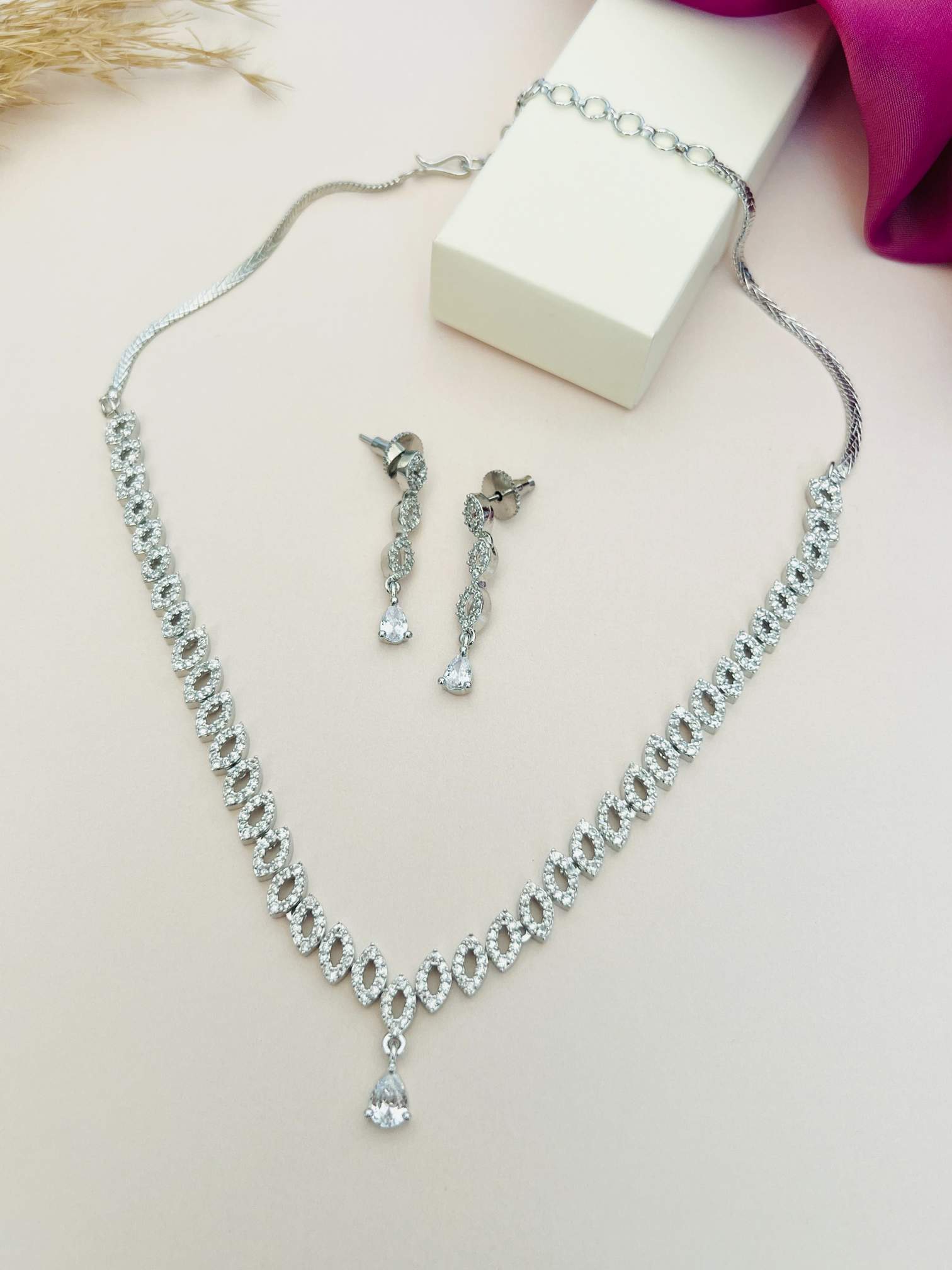 Elegant Silver Plated American Diamond Necklace Set by Abdesignsjewellery with matching earrings