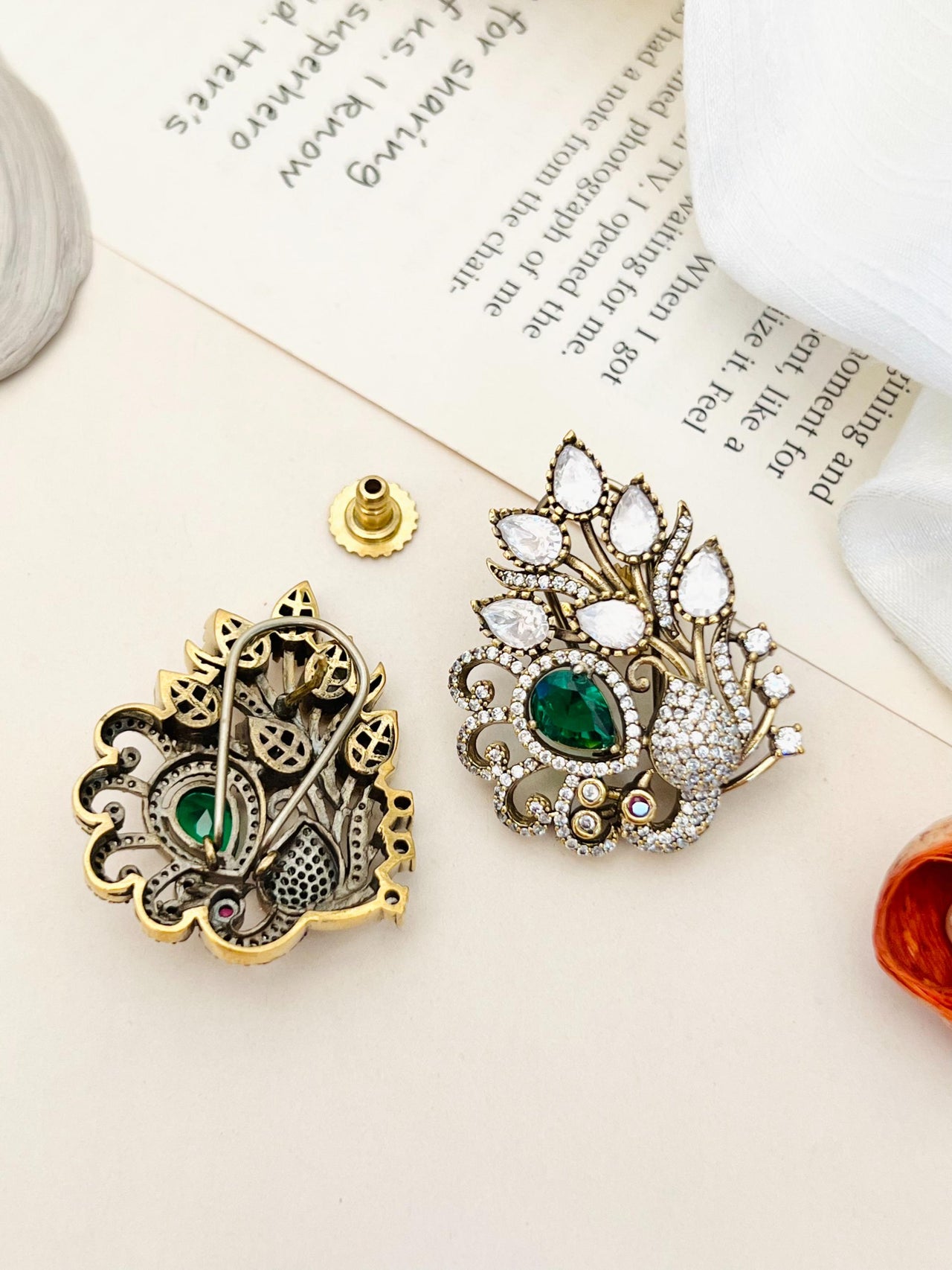 Abdesignsjewellery Emerald Antique Peacock Polki Stud Earring with green gemstone and intricate gold detailing