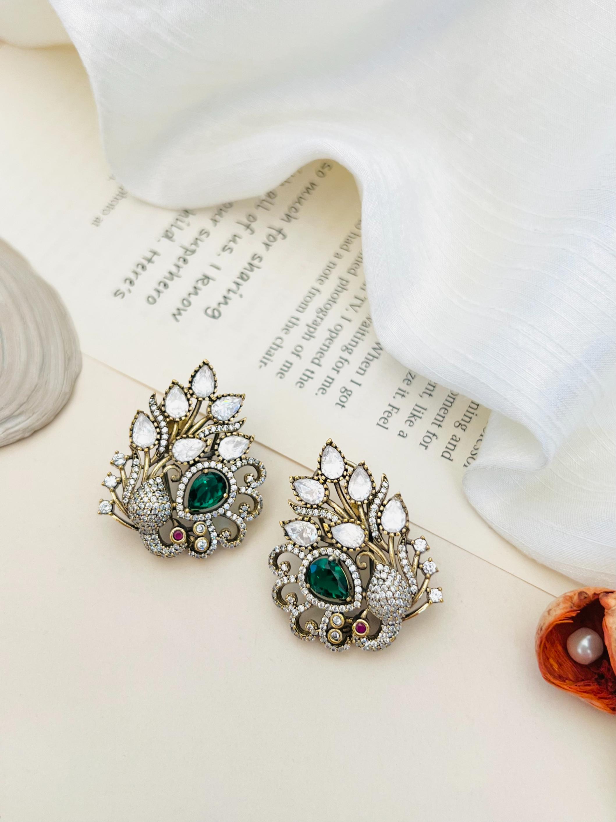 Emerald Antique Peacock Polki Stud Earring by Abdesignsjewellery with intricate design and green gemstone