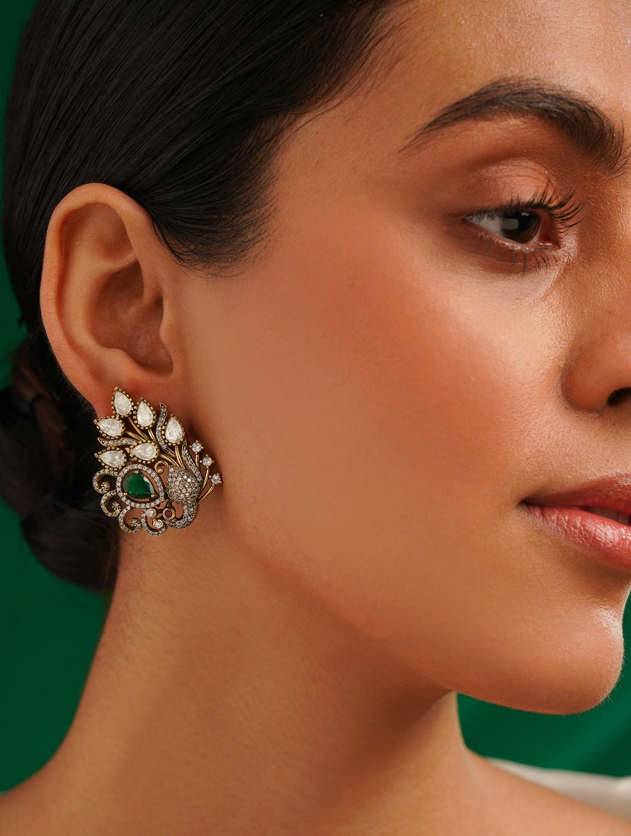 Emerald Antique Peacock Polki Stud Earring by Abdesignsjewellery worn on ear with intricate design