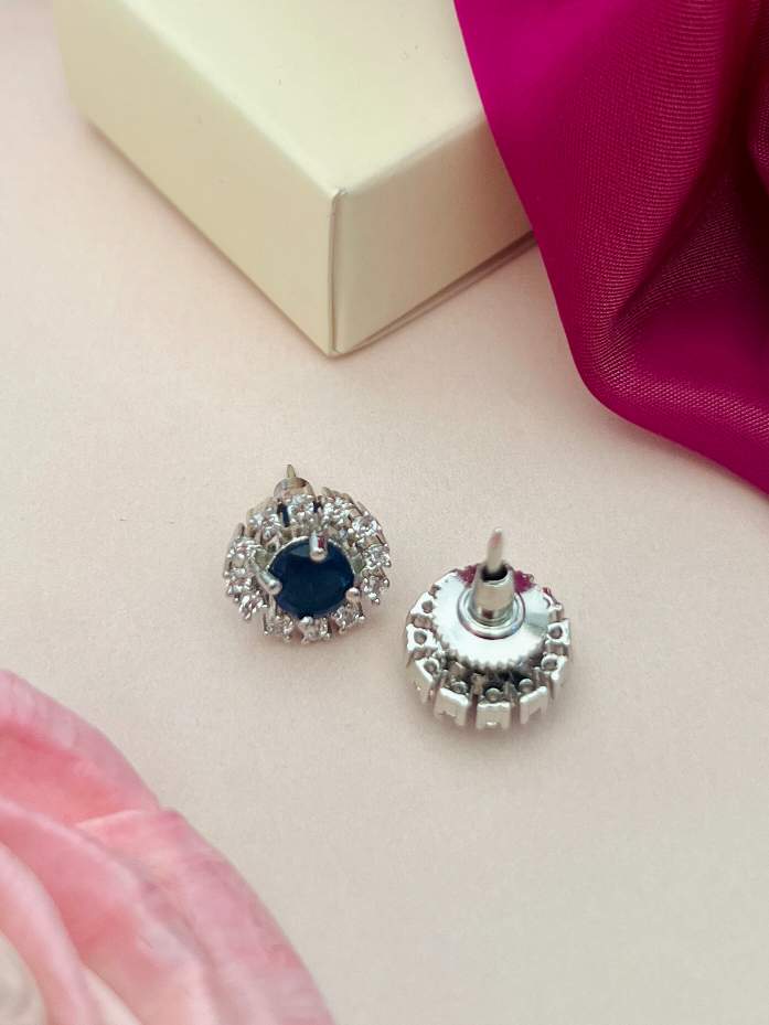 Emerald & CZ Stud Earrings - Elegant Silver by Abdesignsjewellery displayed with gift box and fabric background