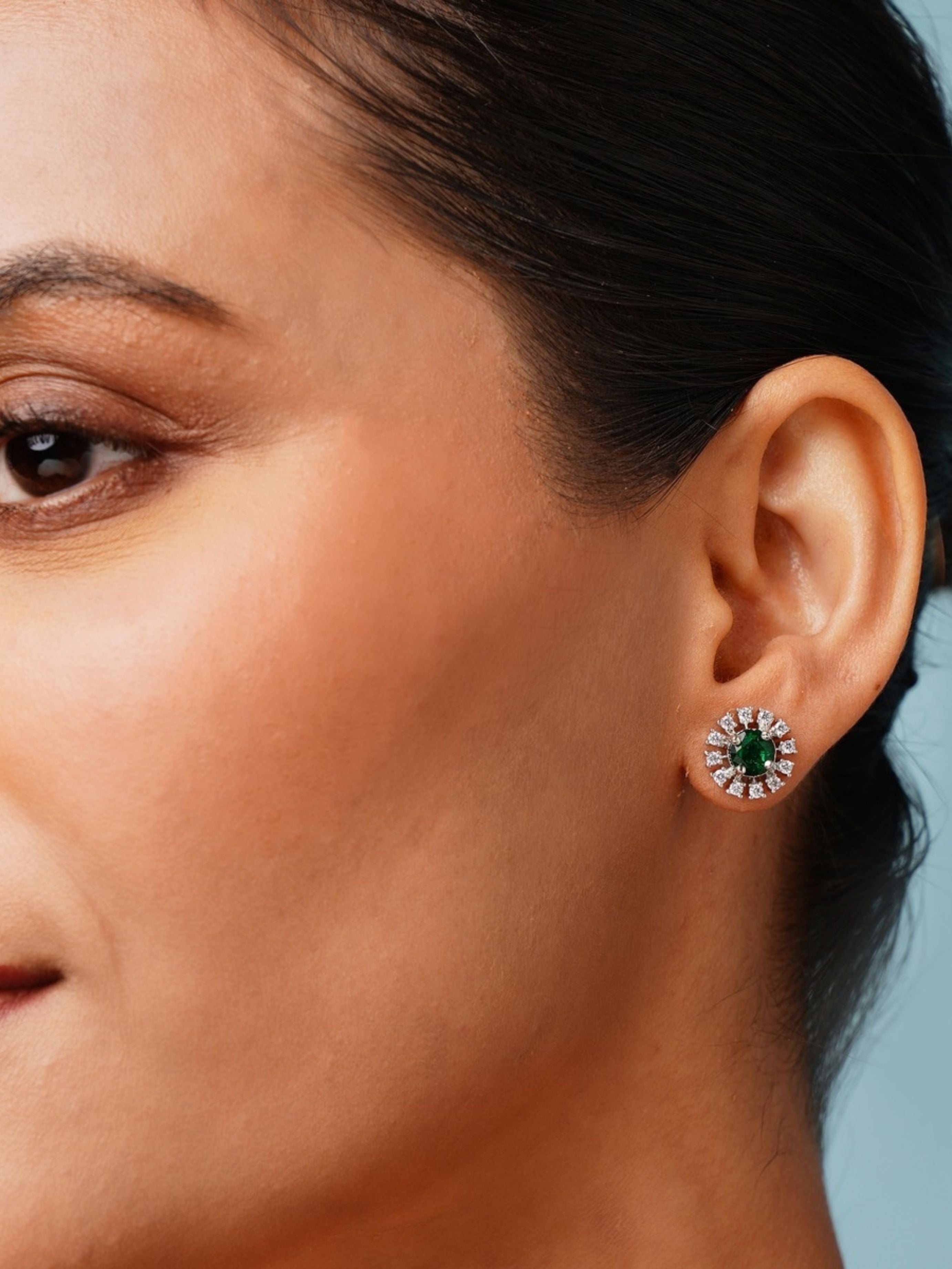 Emerald & CZ Stud Earrings - Elegant Silver worn on a woman's ear by Abdesignsjewellery