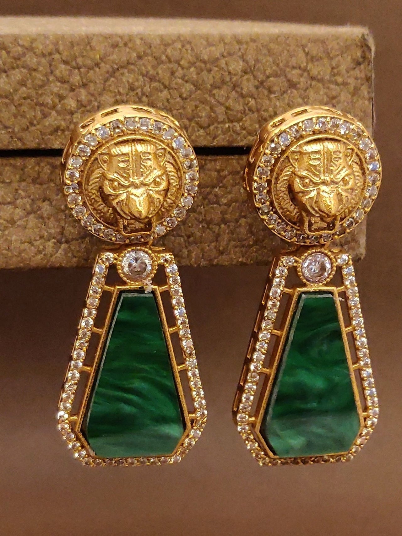 Elegant Emerald Sabyasachi Earrings with Gold Accents and Sparkling Rhinestones