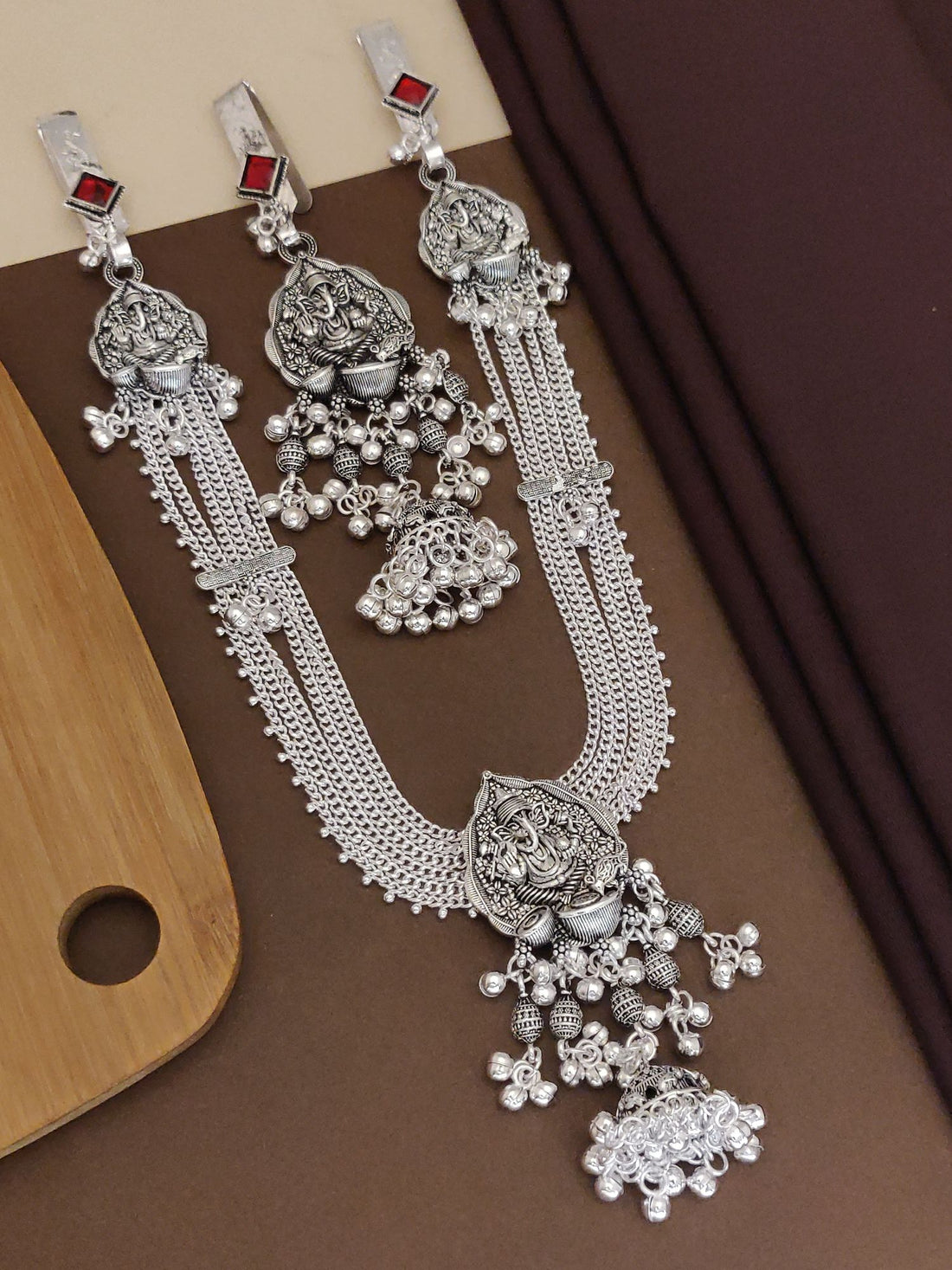 Ganesh style Juda pin set with intricate silver detailing and decorative elements for traditional occasions