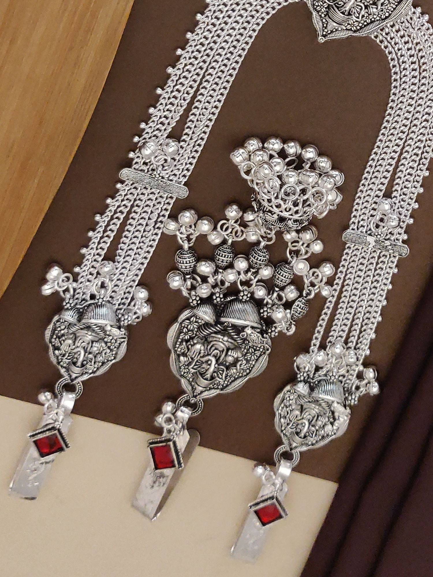 Abdesignsjewellery Ganesh style Juda pin set in silver with intricate detailing and gemstone accents