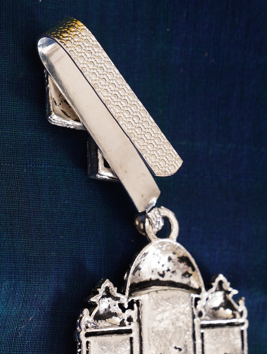 German Silver Antique Plated Saree Waist Juda Pin with intricate textured design on dark fabric background