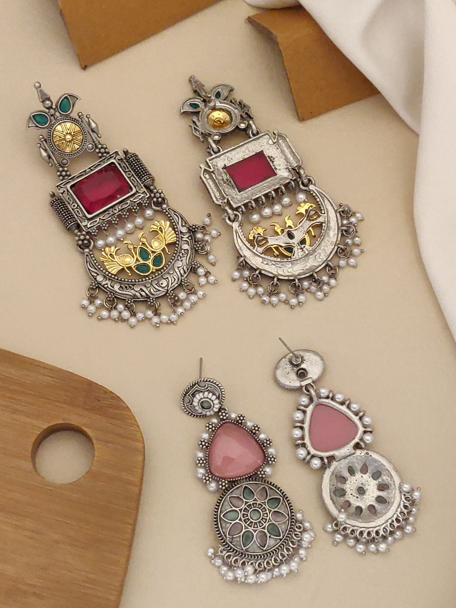 German silver earrings combo featuring intricate designs and colorful embellishments for stylish looks