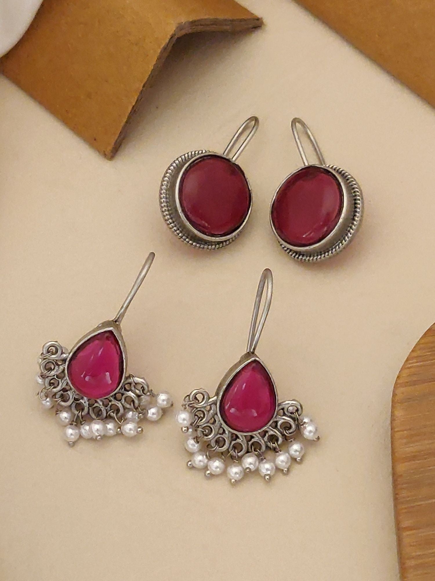German Silver Set Of 2 Earring Combo featuring elegant designs with pink stones and pearls