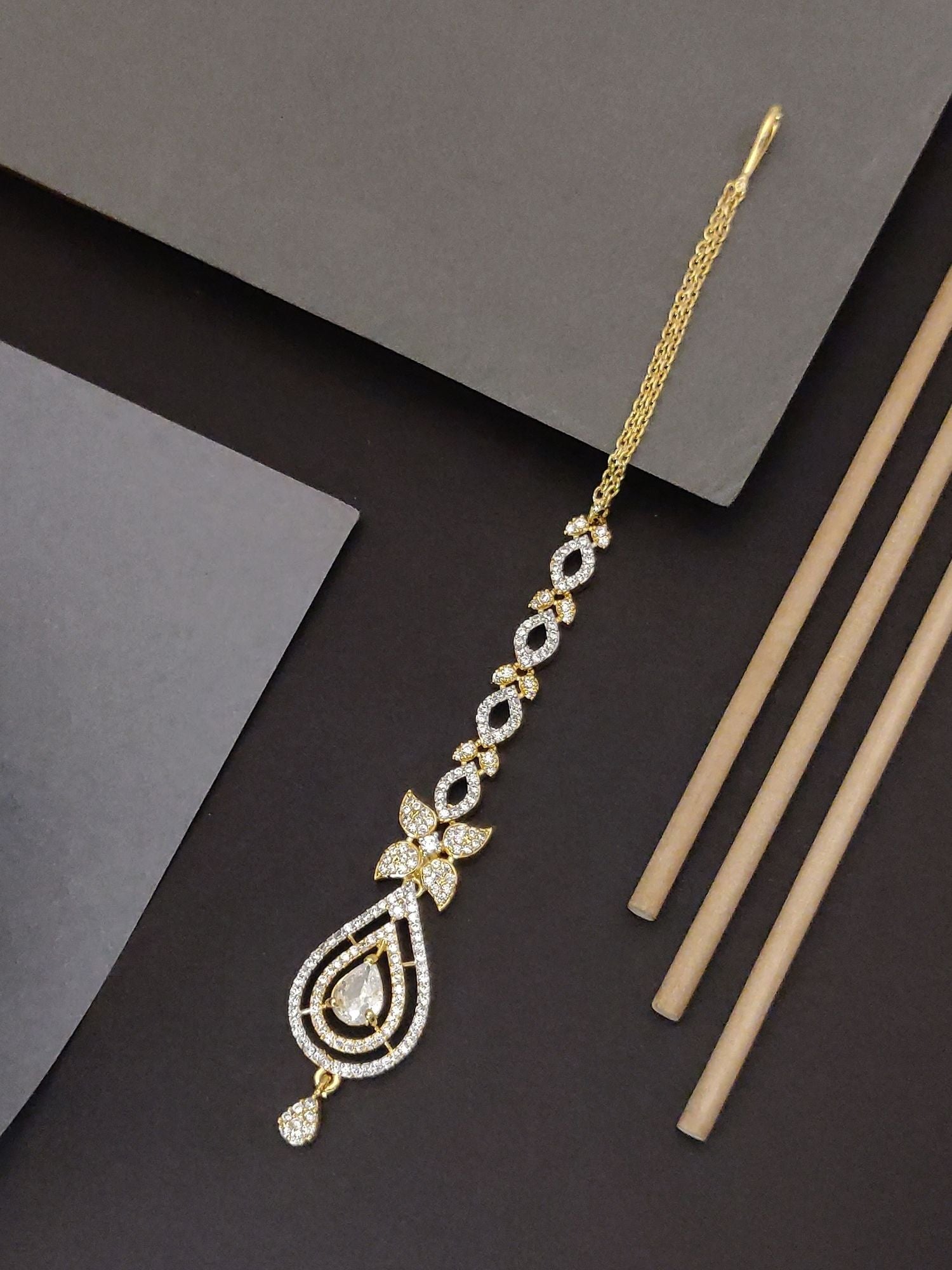 Gold Plated American Diamond Maangtikka with Intricate Design and Elegant Finish