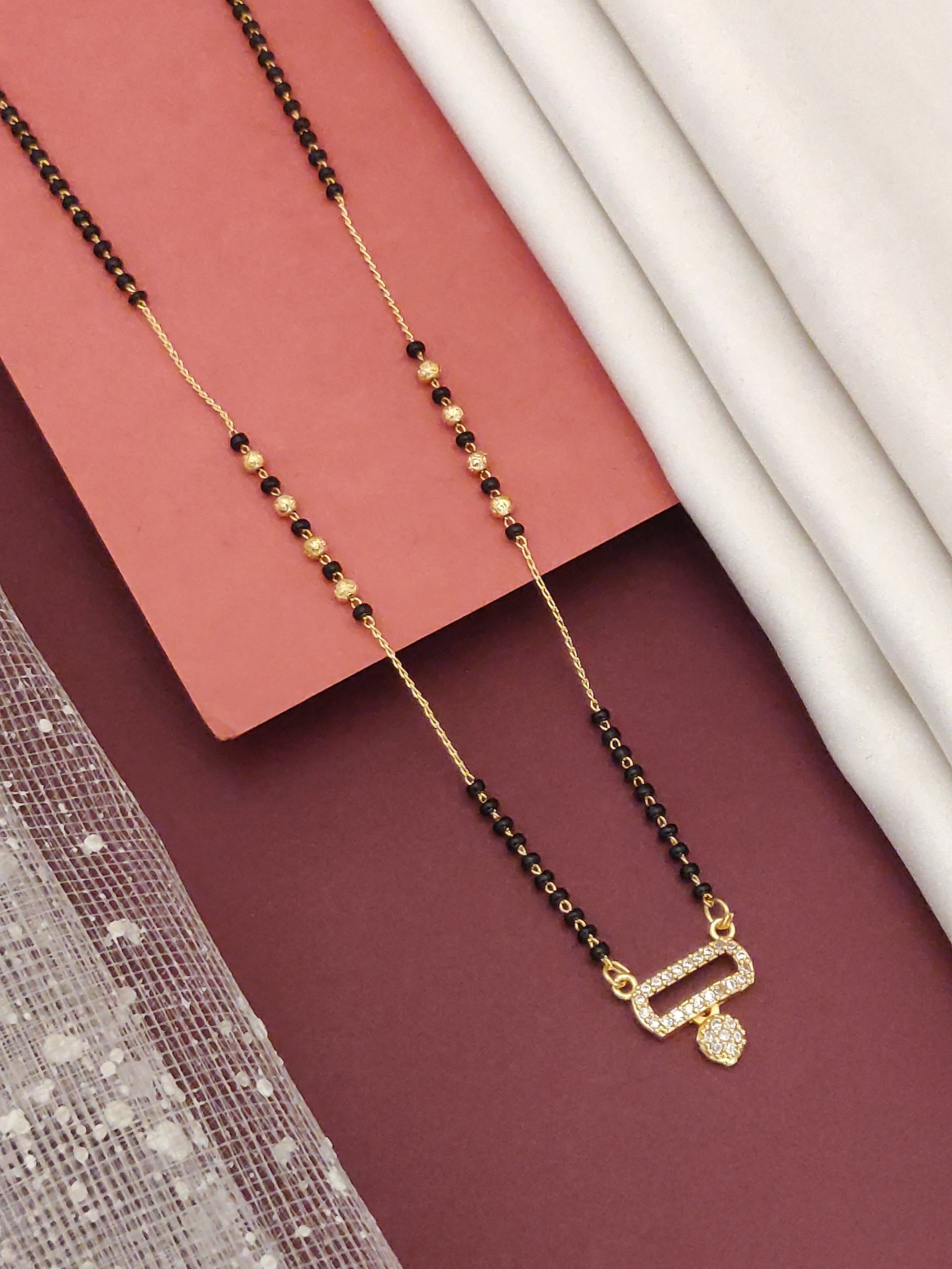 Gold Plated American Diamond Mangalsutra with Black Beads and Elegant Design