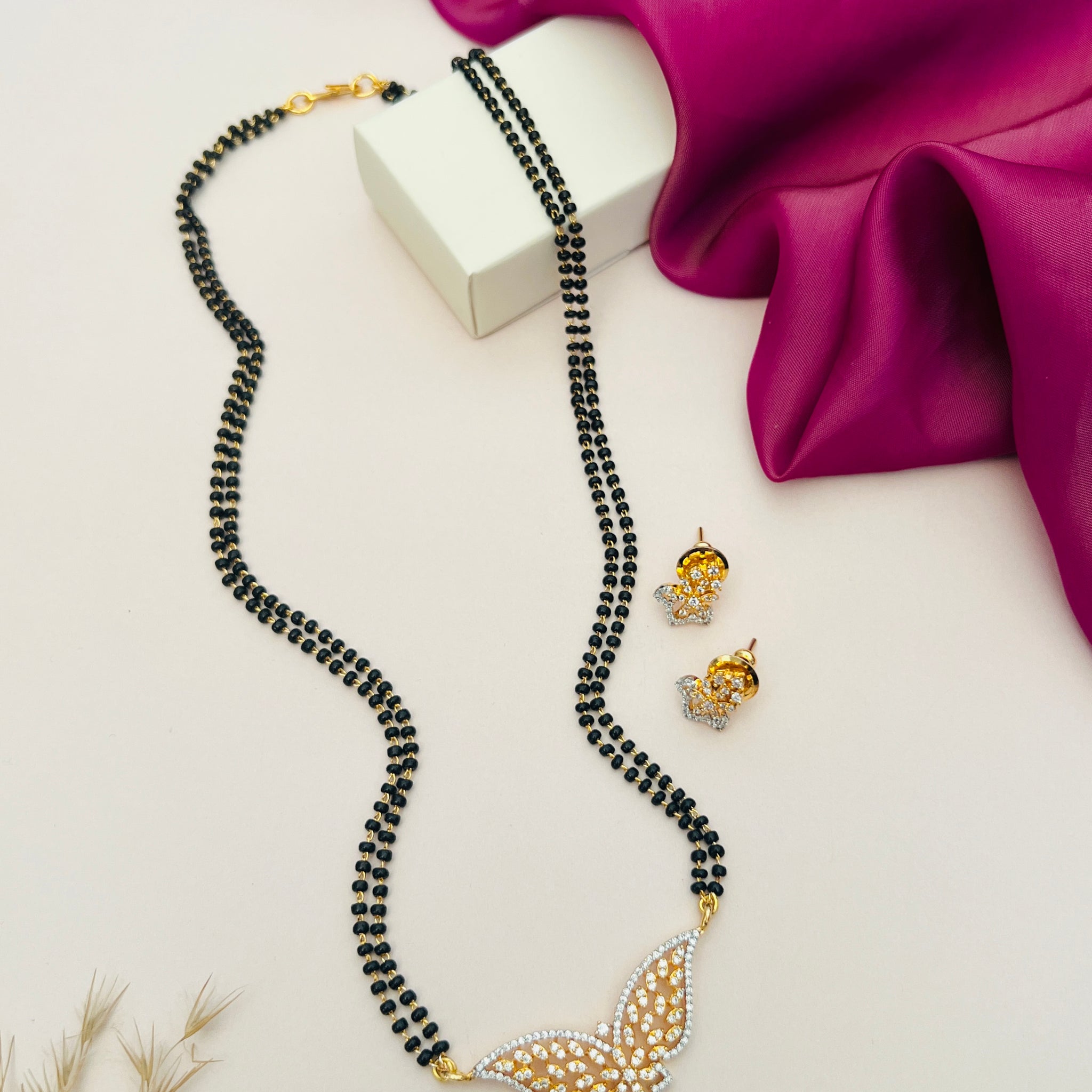 Gold Plated American Diamond Mangalsutra Set with black beads and butterfly pendant by Abdesigns