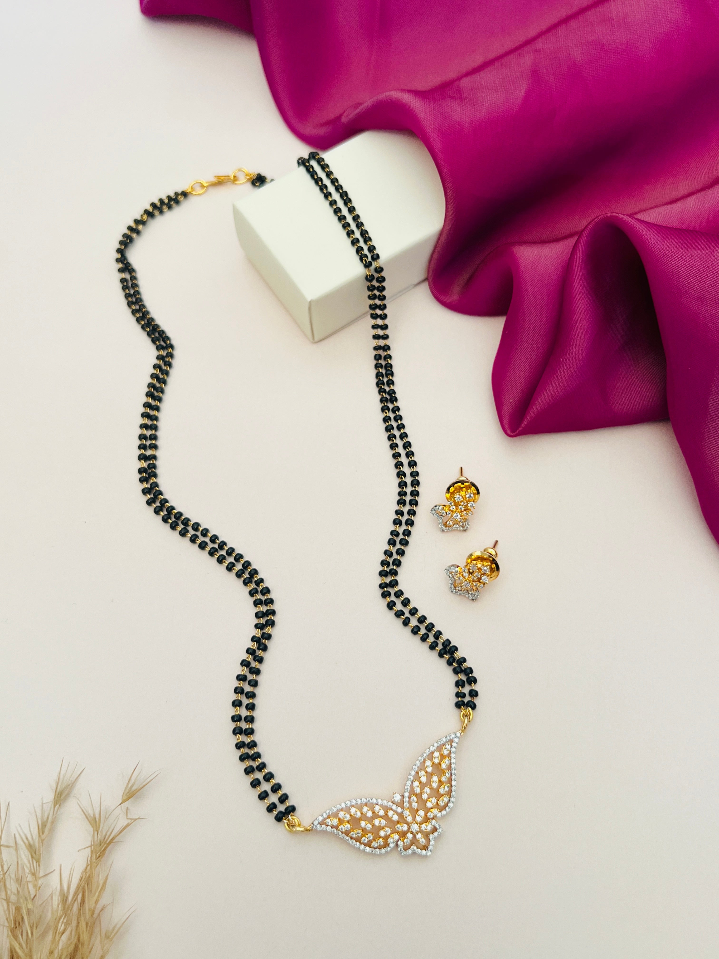 Gold Plated American Diamond Mangalsutra Set with black beads and butterfly pendant by Abdesigns