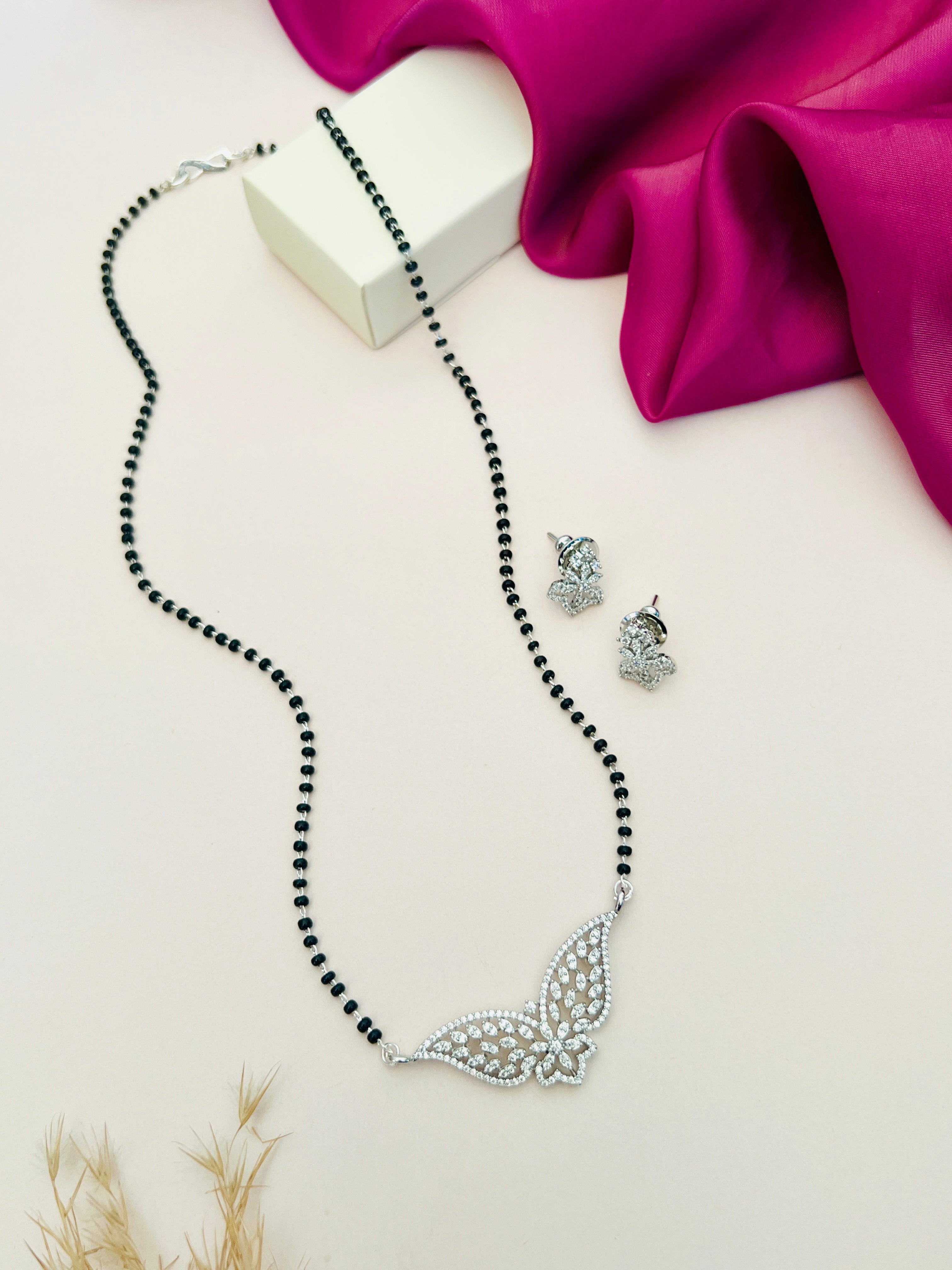 Gold Plated American Diamond Mangalsutra Set with black beads and butterfly pendant by Abdesignsjewellery