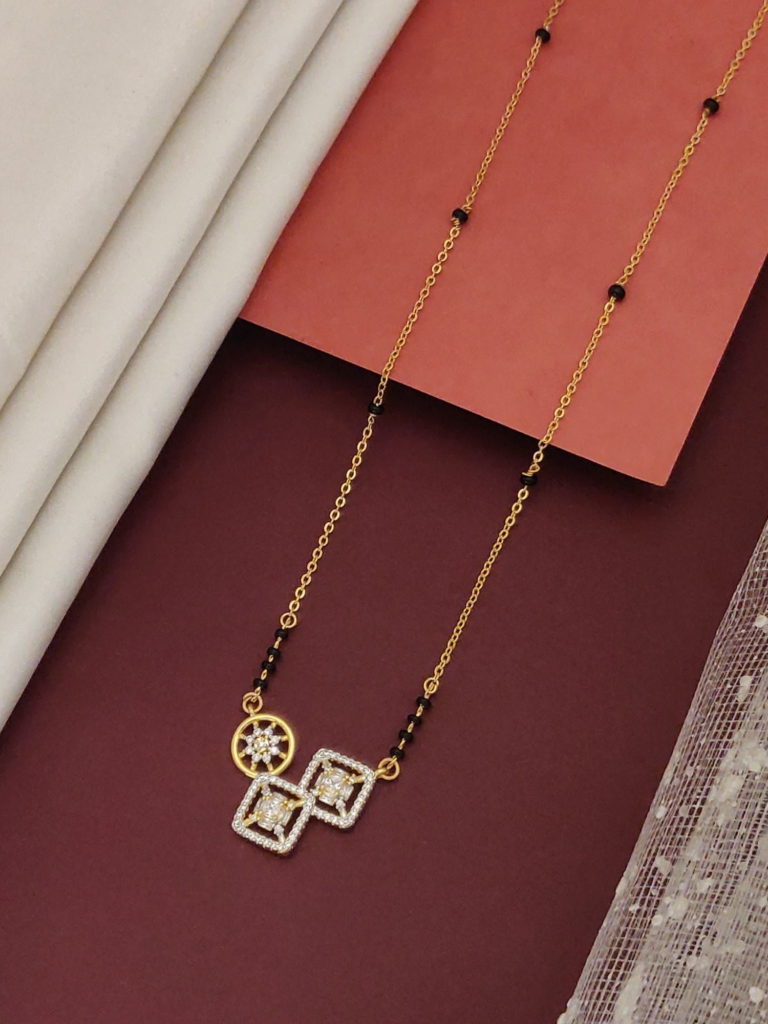 Gold Plated American Diamond Mangalsutra with elegant geometric pendant and black bead chain by Abdesignsjewellery