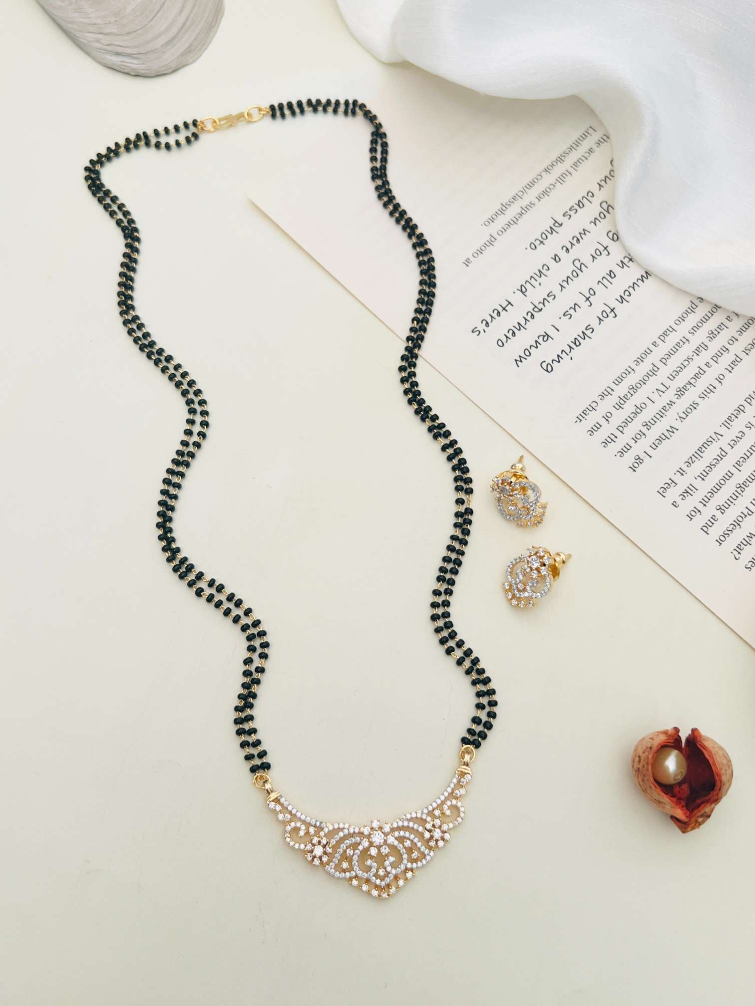Gold Plated American Diamond Wedding Mangalsutr with black beads and matching earrings by Abdesignsjewellery