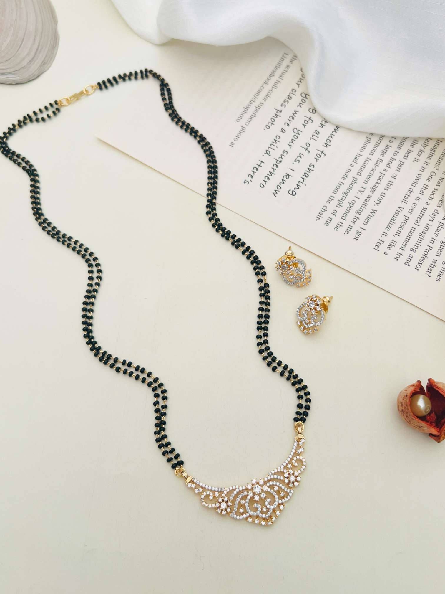 American Diamond Wedding Mangalsutra Set with intricate pendant and matching earrings by Abdesignsjewellery