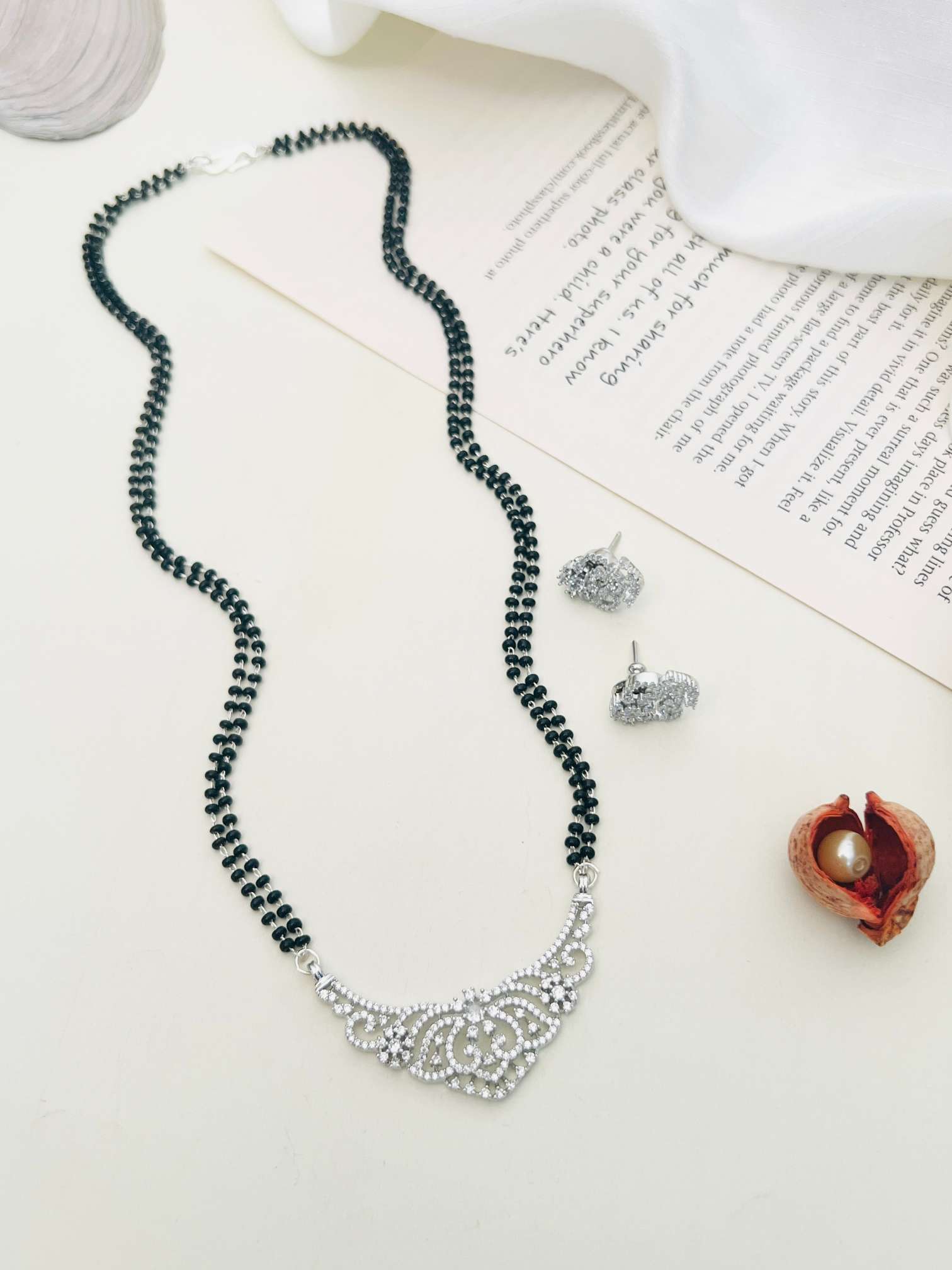 Gold Plated American Diamond Wedding Mangalsutra Set with black beads and matching earrings by Abdesignsjewellery