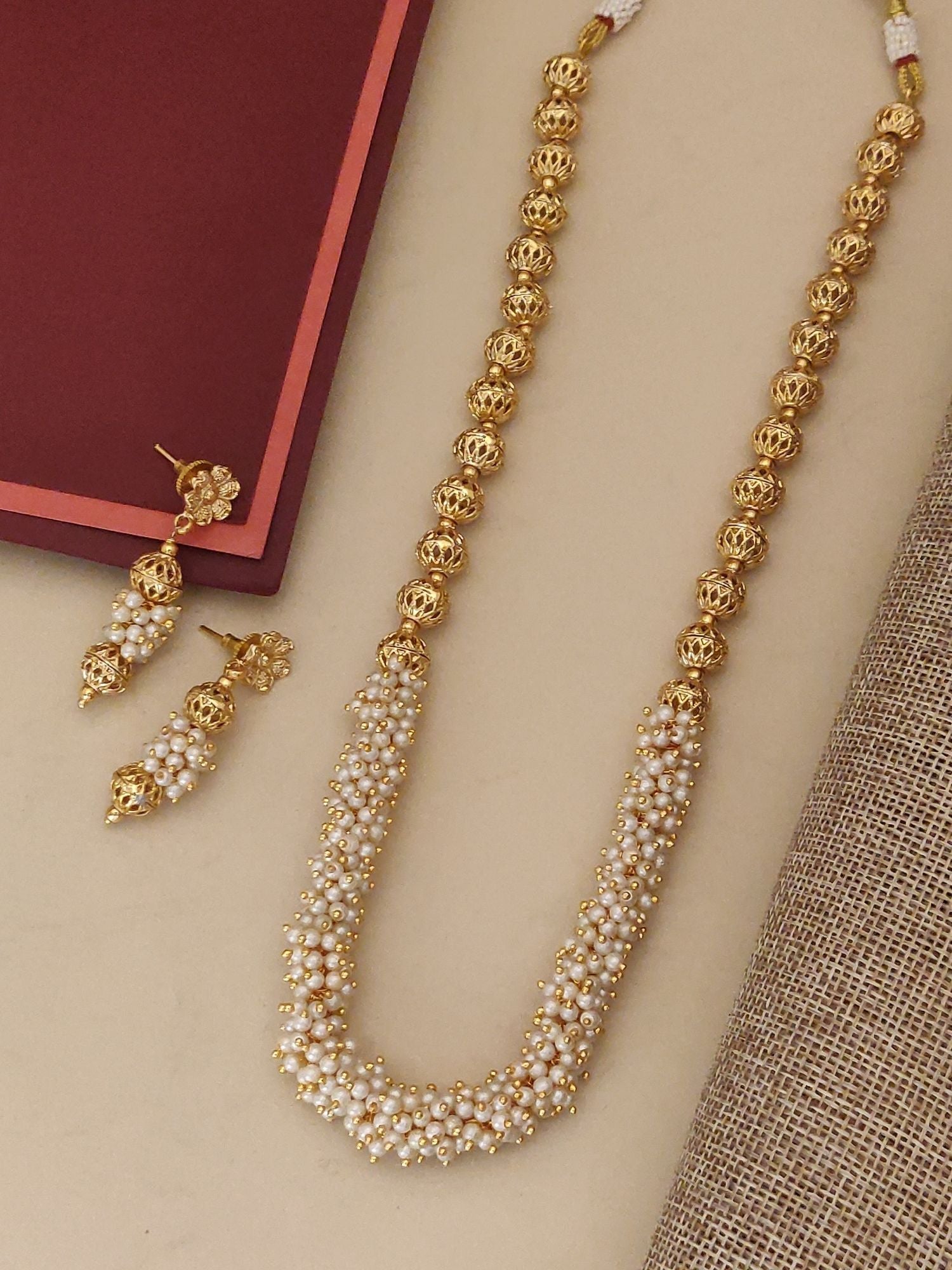 Gold Plated Beads Necklace Set featuring intricate design with matching earrings for elegant styling