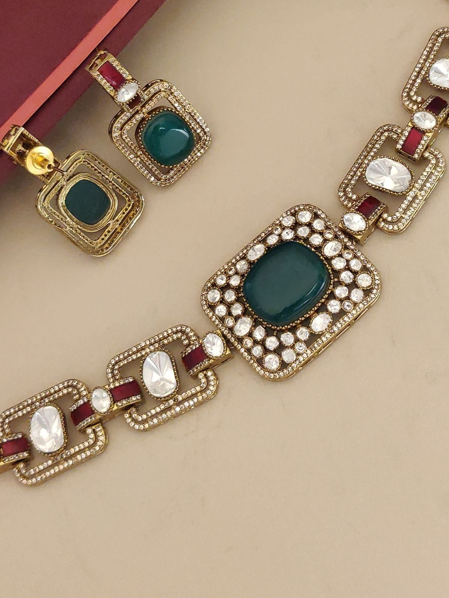 Gold Plated Green Stone Choker Necklace with Elegant Design and Matching Earrings