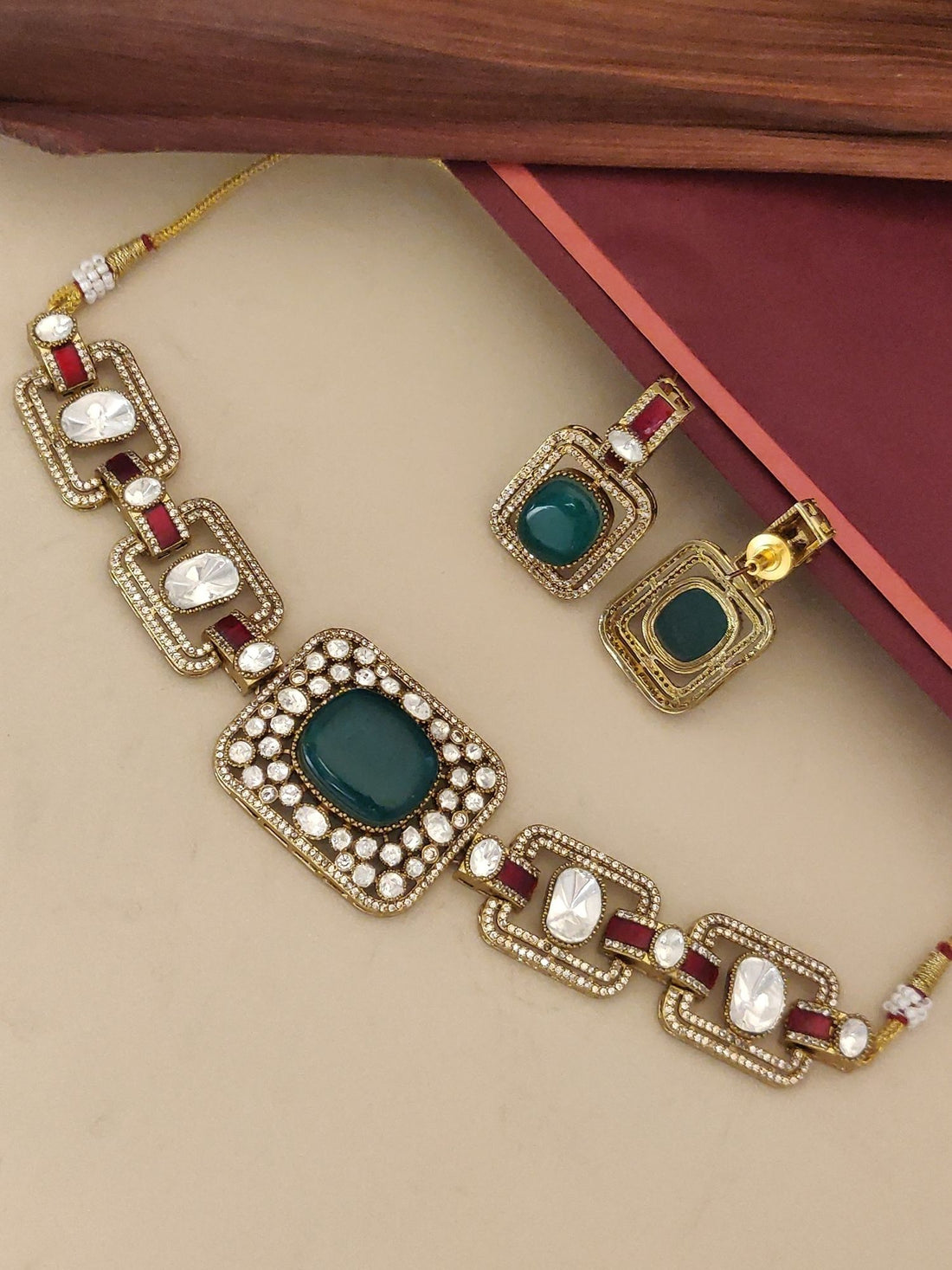 Gold Plated Green Stone Choker Necklace with intricate design and matching earrings for elegant styling