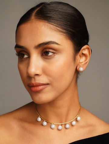 Abdesignsjewellery Gold Plated Hasli Necklace Set with round detailed pendants worn by model