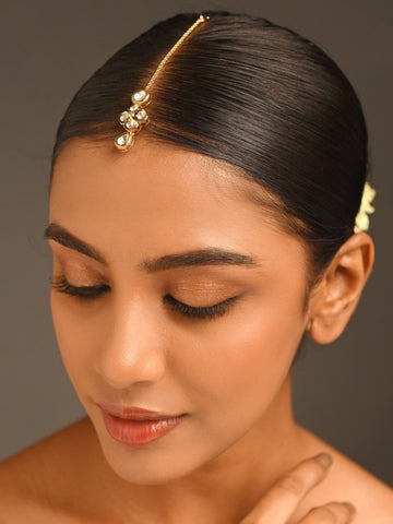 Gold Plated Kundan Maangtikka worn by woman with sleek hair and natural makeup from Abdesignsjewellery