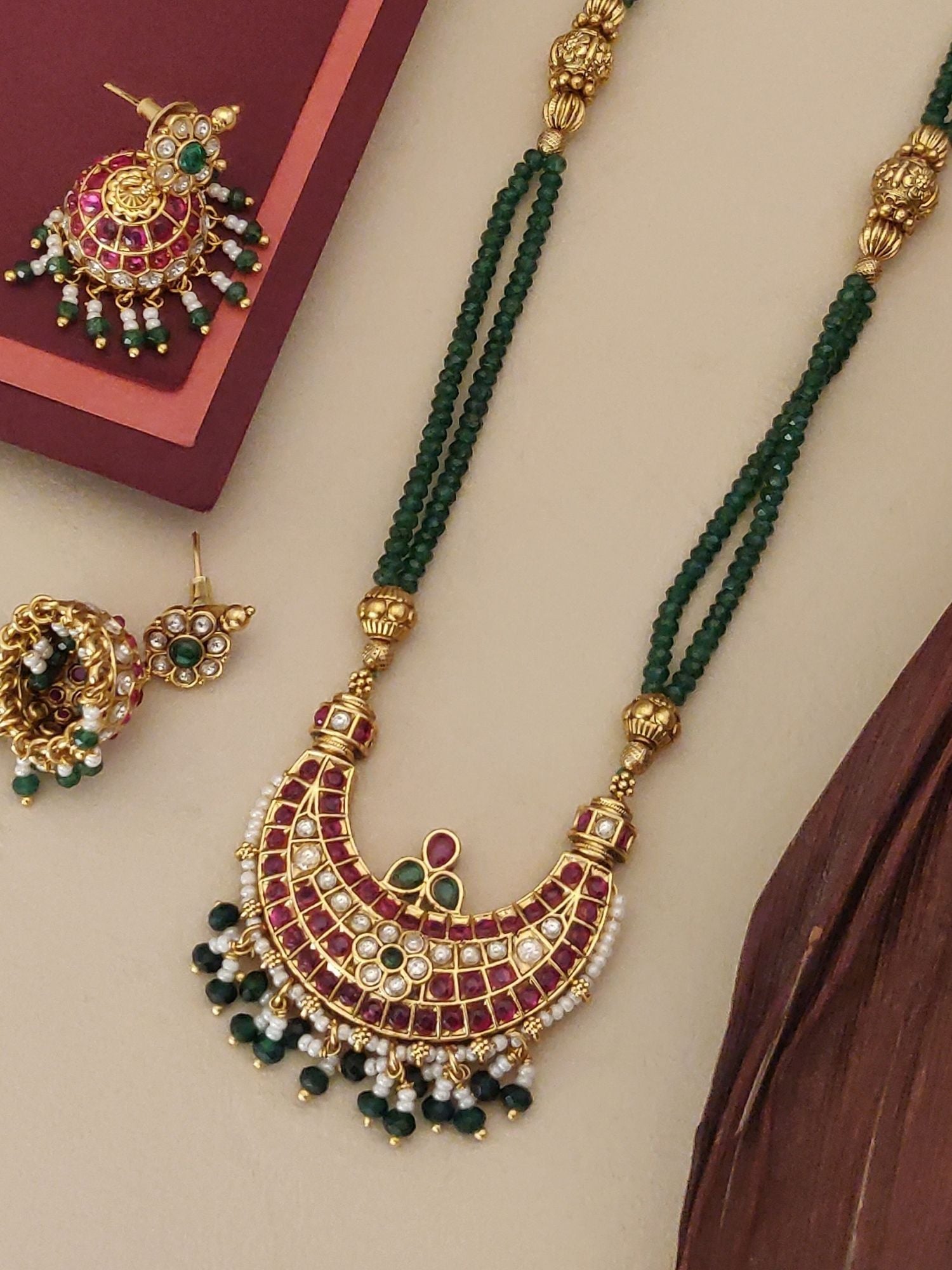 Traditional gold plated long necklace with colorful beads and matching earrings for special occasions