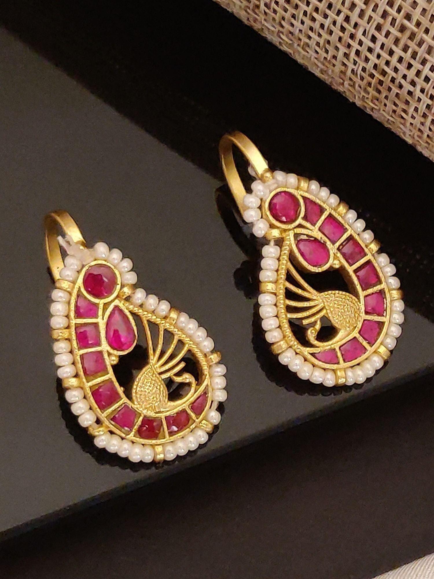 Teardrop gold earrings with peacock motif seed pearl border and ruby insets gold plated pearl ruby earrings