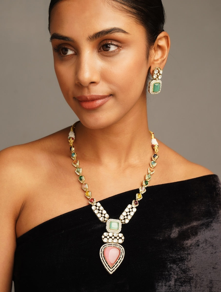 Gold Plated Polki Bridal Necklace Set with multicolor stones worn by woman in black off-shoulder top