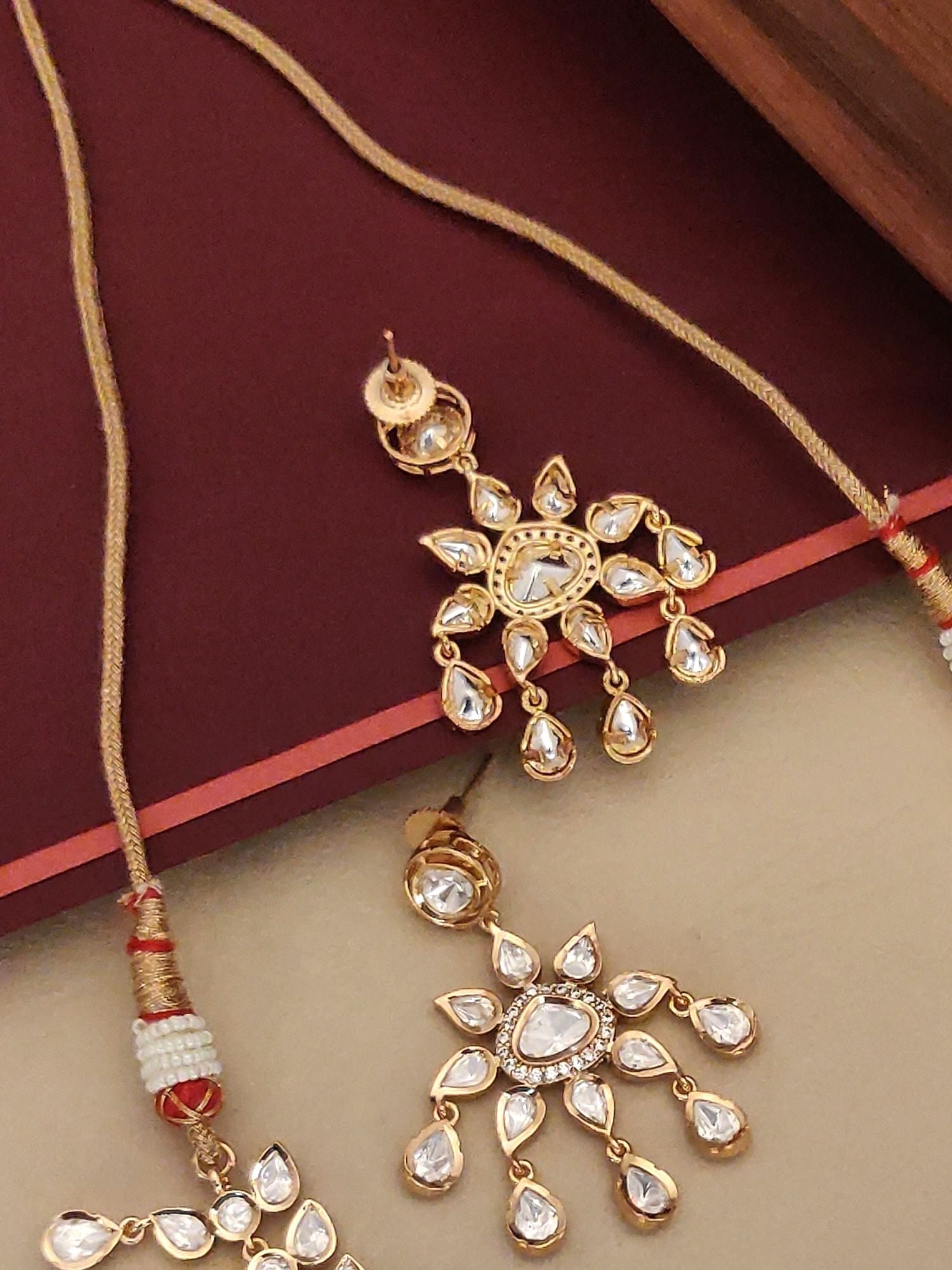 Gold Plated Polki Flower Necklace with intricate design and sparkling details for elegant occasions