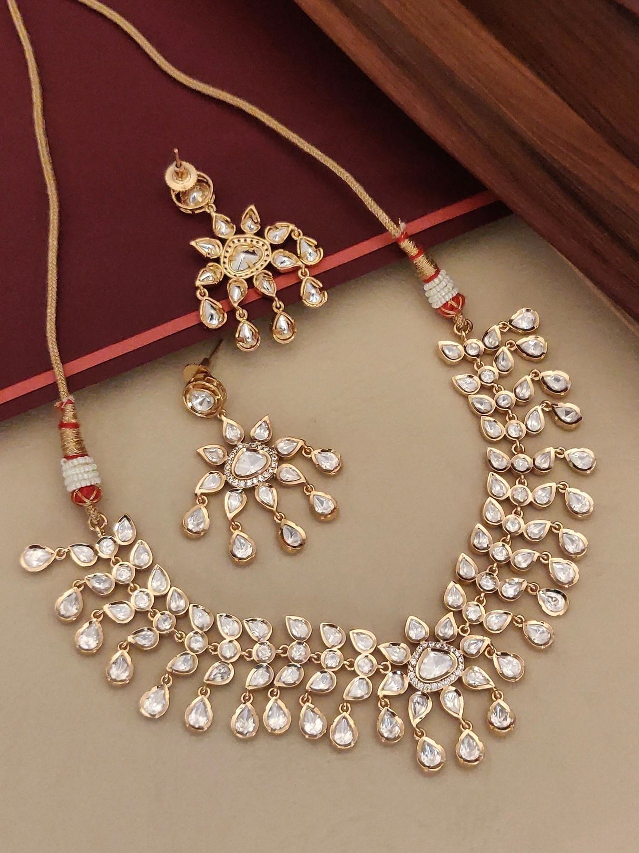 Gold Plated Polki Flower Necklace with intricate design and matching earrings for elegant occasions